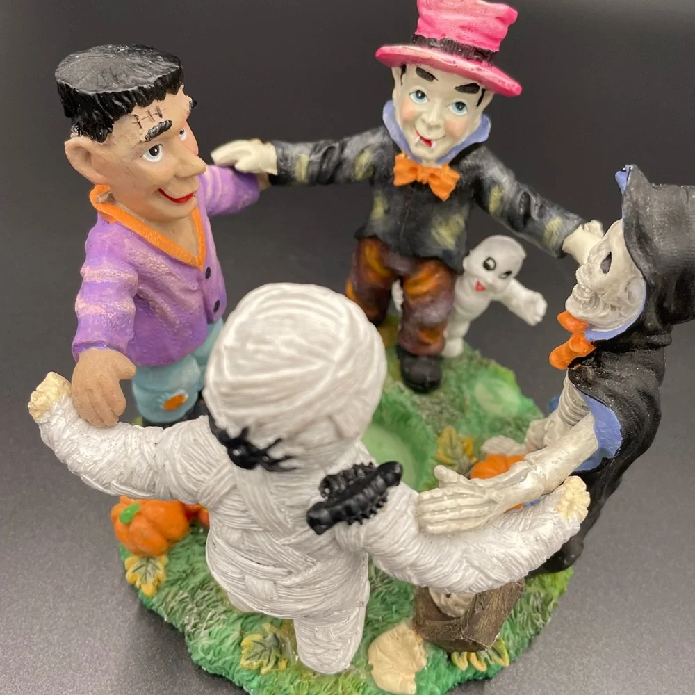 Halloween 5”w x  4”h Holding Hands Resin Circular Candle